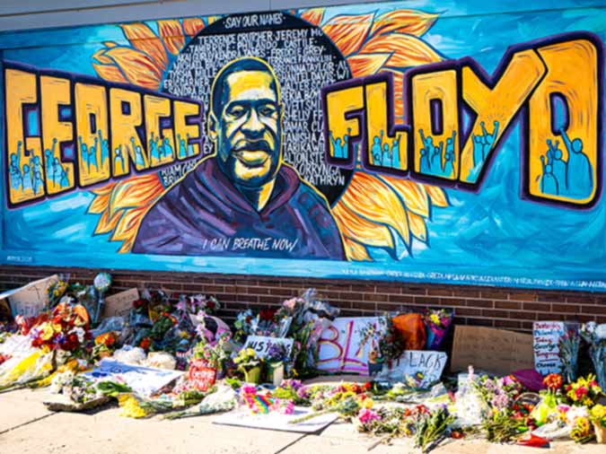 Beautiful yellow and blue graffiti mural in Chicago honoring George Floyd.